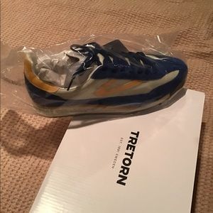 Never worn Tretorn sneakers. 9.5.